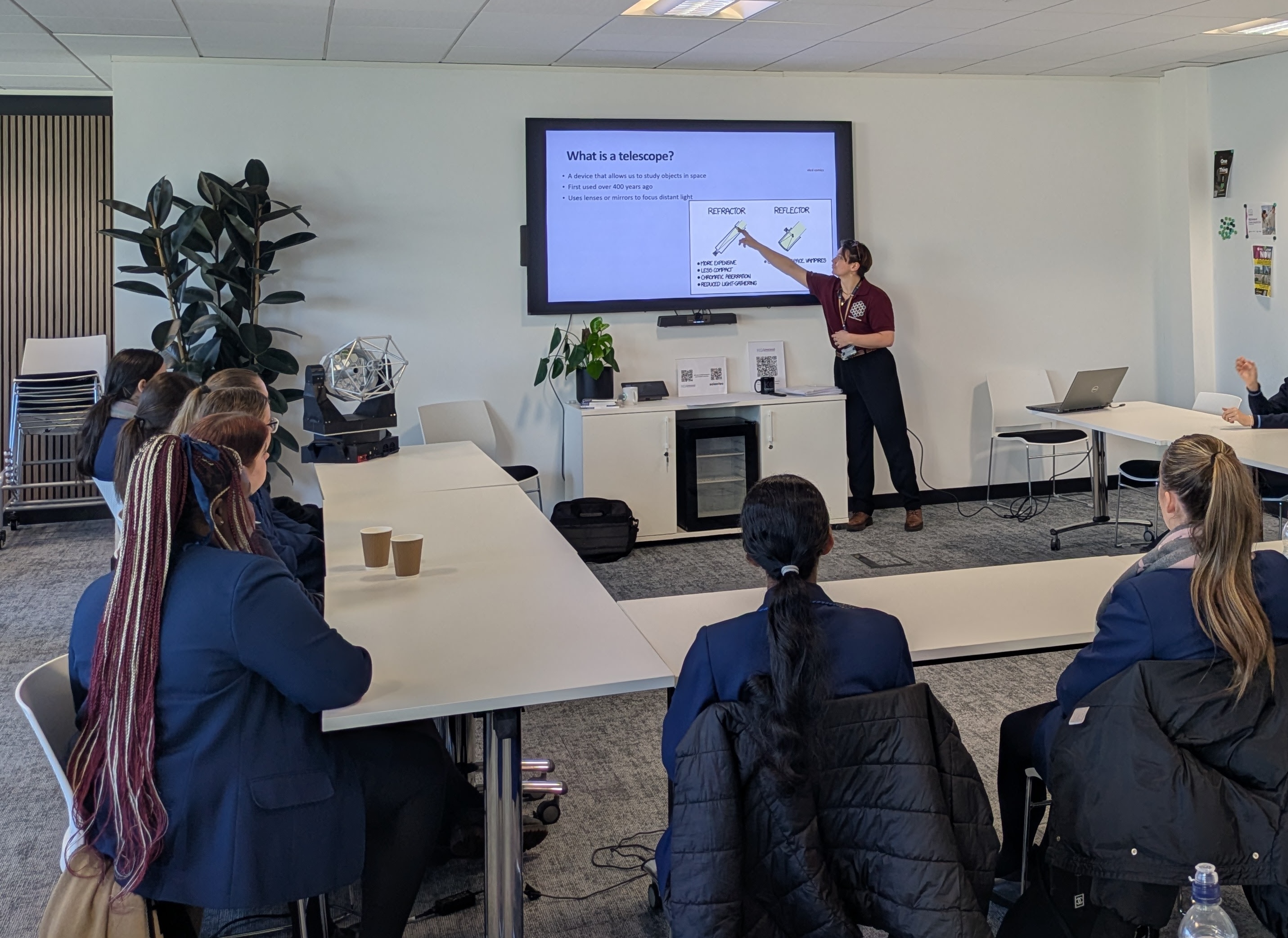 Chlo&eacute; introduces different types of telescopes to the school children